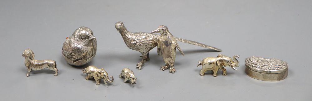 An Edwardian silver mounted hatching chick pin cushion, etc.